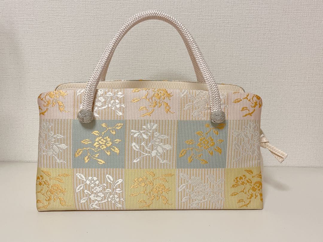 伊と忠利休バッグ