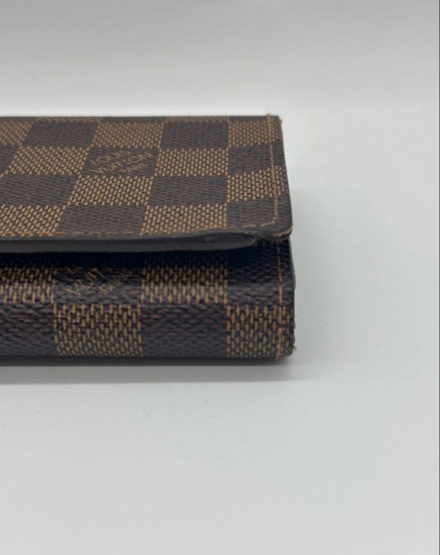 ルイヴィトン ダミエ エベヌ ポルトモネビエ トレゾール 二つ折り財布