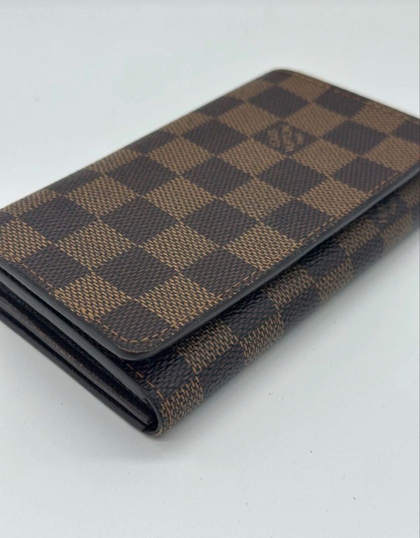 ルイヴィトン ダミエ エベヌ ポルトモネビエ トレゾール 二つ折り財布