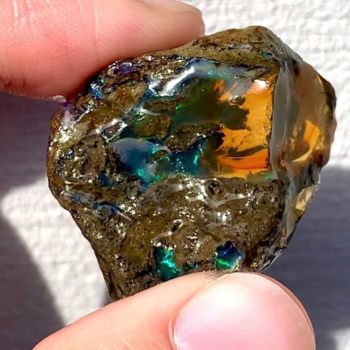 青い斑の浮かぶ魅力的なオレンジオパール73.5ct/ファイアオパール/鉱物