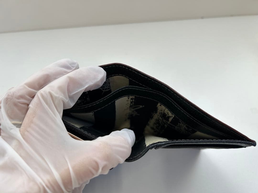 ① ヴィヴィアン ウエストウッド 財布 がま口 黒