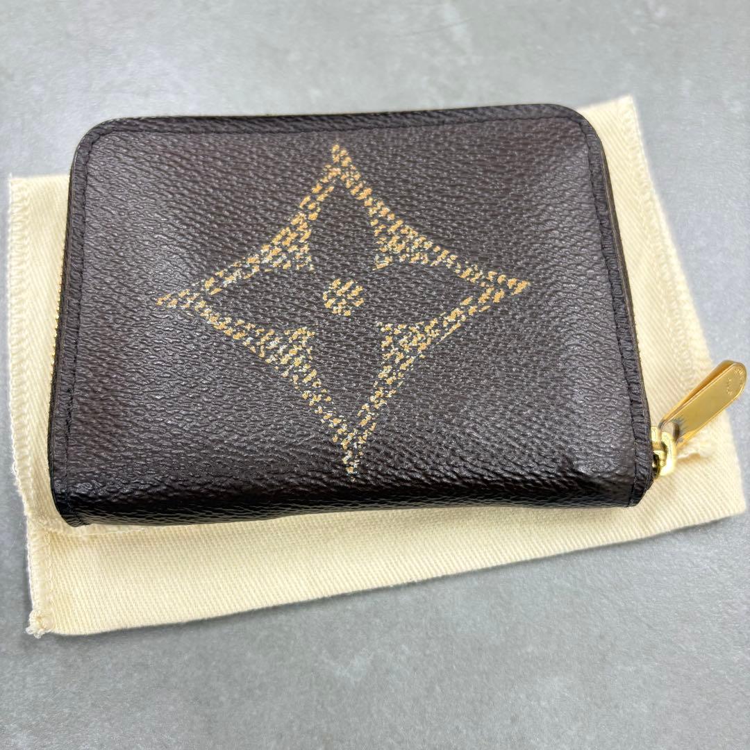 YUNO　ジャイアントモノグラム ジッピーケース M69354