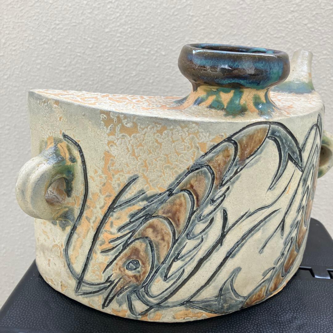 金城次郎　抱瓶