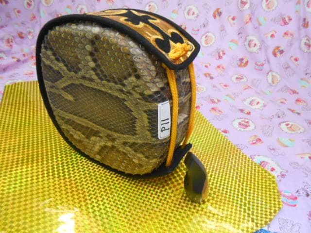 P11現品販売(送料無料)16.980円　沖縄三線専用　蛇皮強化張チーガ、黒檀爪