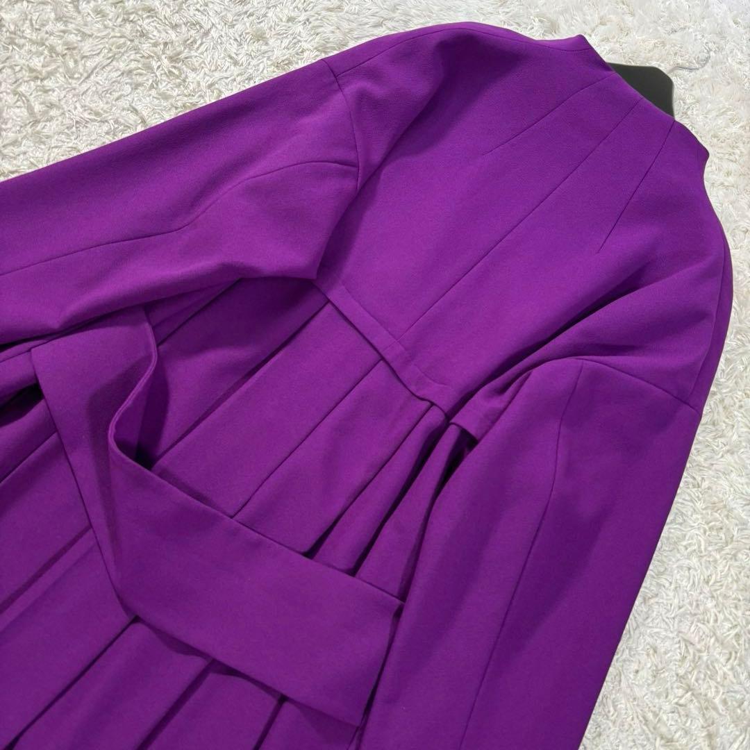 UN3D ノーカラー プリーツ フレア ボタンレス Aライン ロングコート