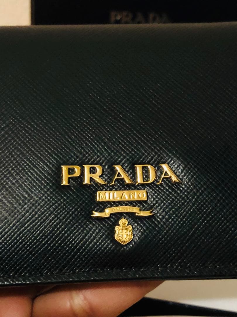 PRADA サフィアーノレザー 二つ折り財布 (ICチップ(RFID)搭載) - メルカリ