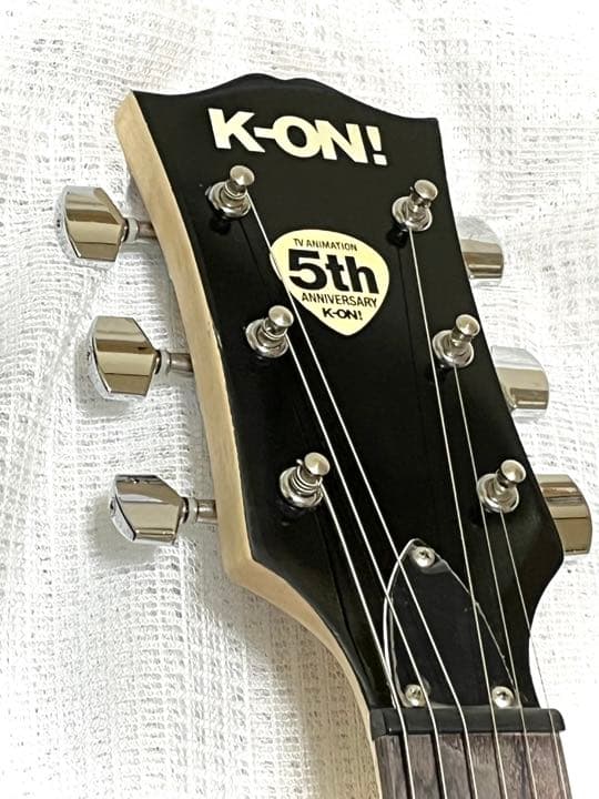 けいおん！5周年スピーカー内蔵 痛ギター - メルカリ