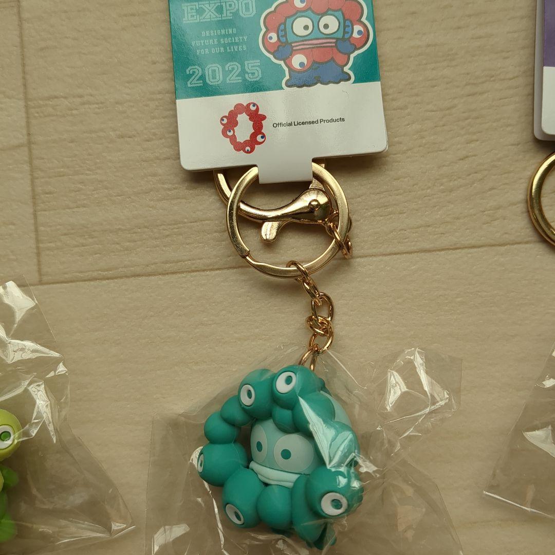 EXPO 2025 ミャクミャクサンリオ押しカラー立体キーホルダー 7 個
