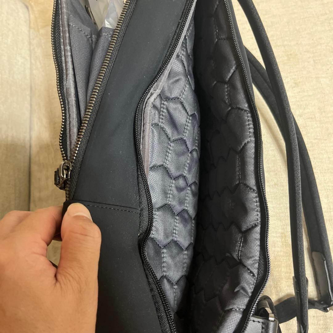 専用布製ケース付き　完全未使用　TUMI ブラック ビジネスバッグ(リュック式