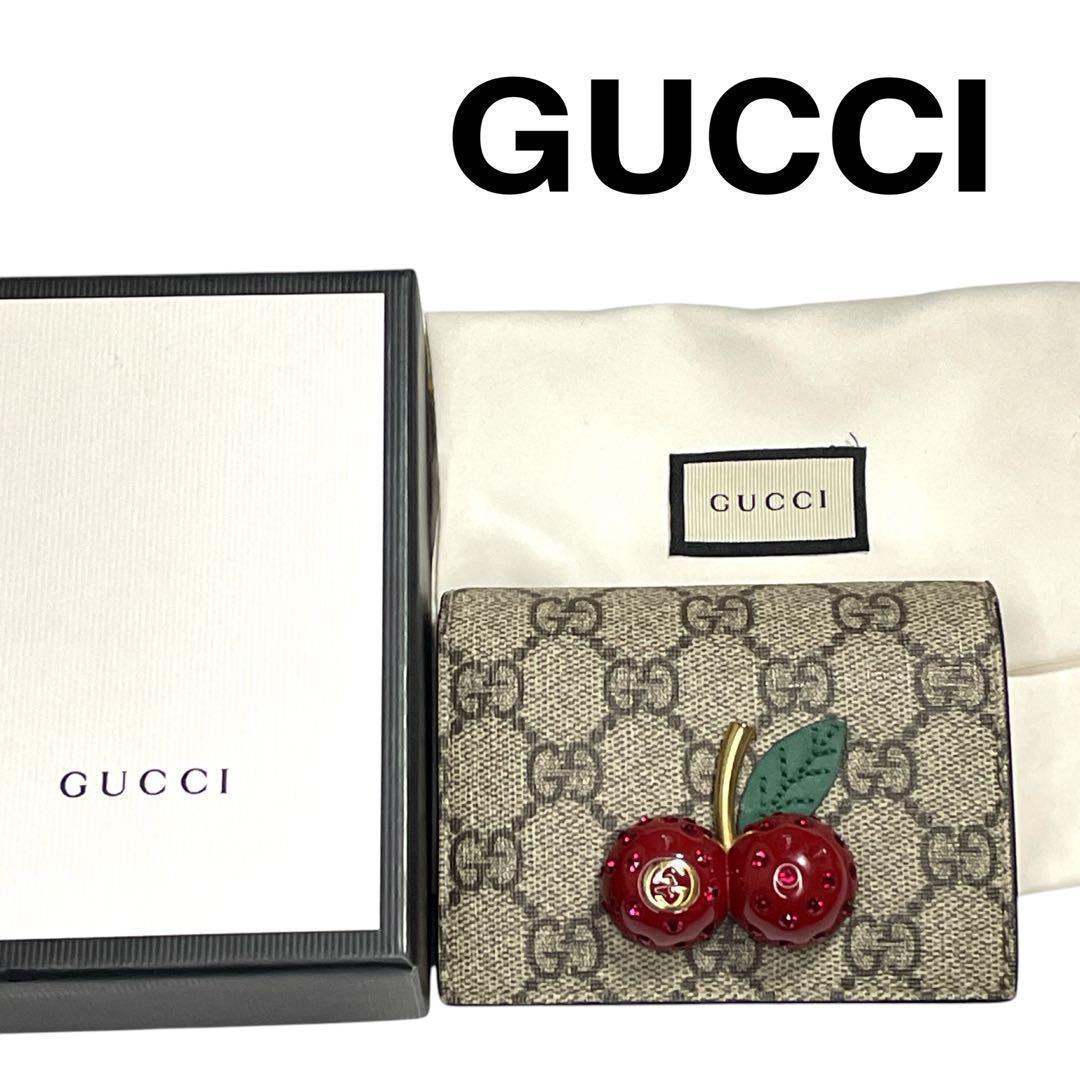グッチ GUCCI GGスプリーム チェリー 二つ折り財布 箱付き - メルカリ