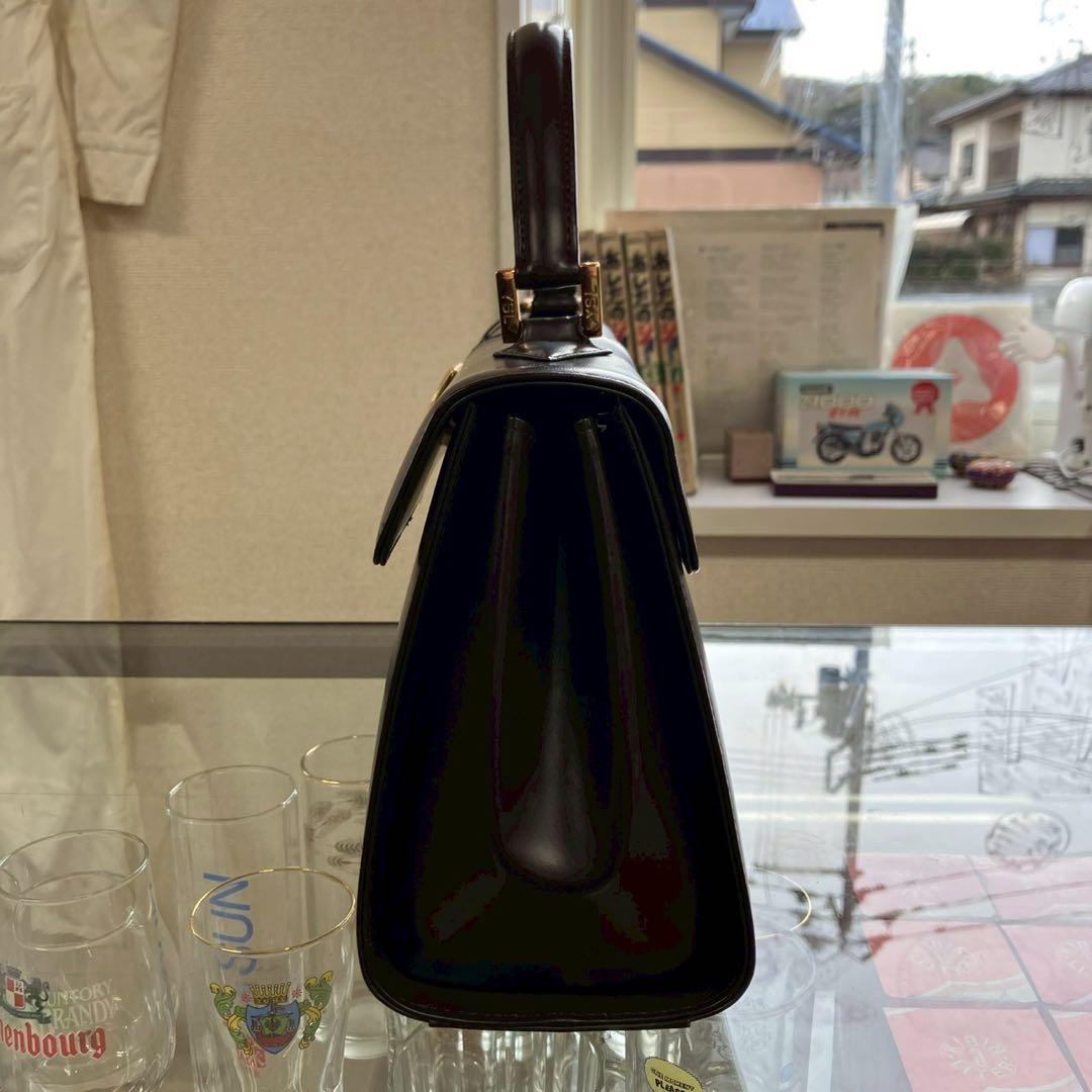 る*る様 未使用　イヴサンローラン　ロゴ金具　ダークブラウン　ハンドバッグ　長期