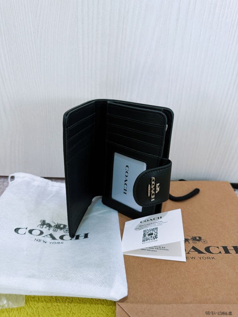COACH 二つ折り財布 ブラック/ホワイト