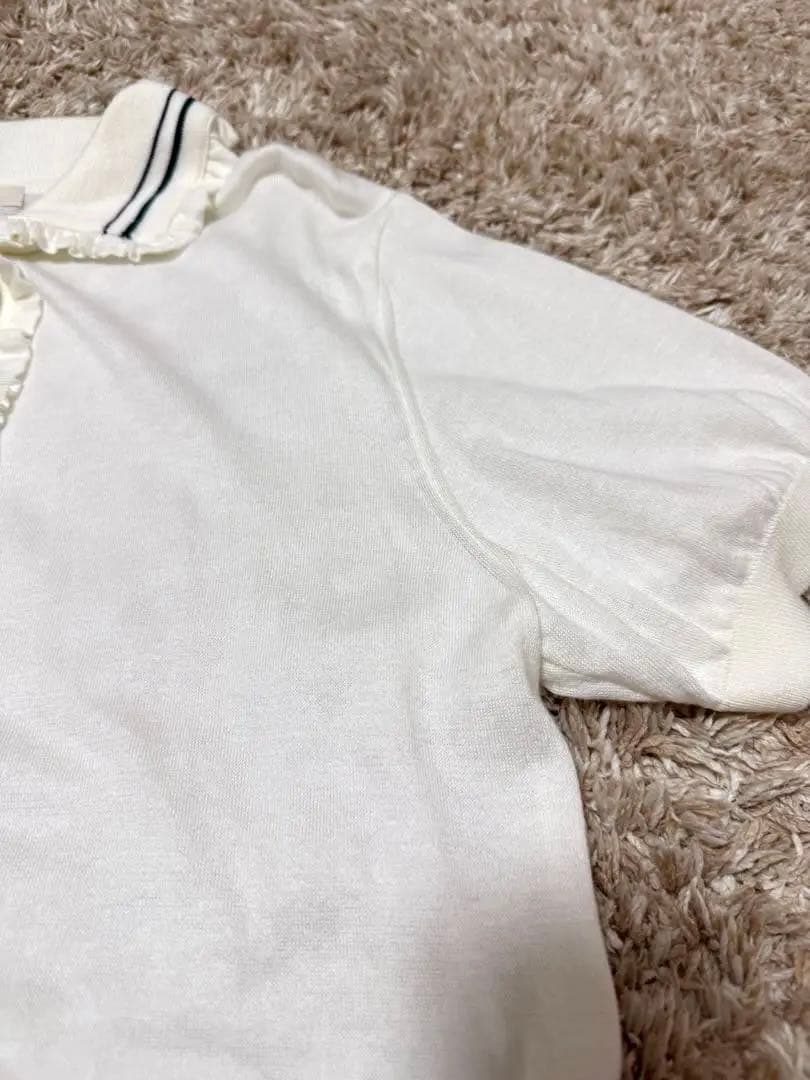 yori ミニフリルポロニット