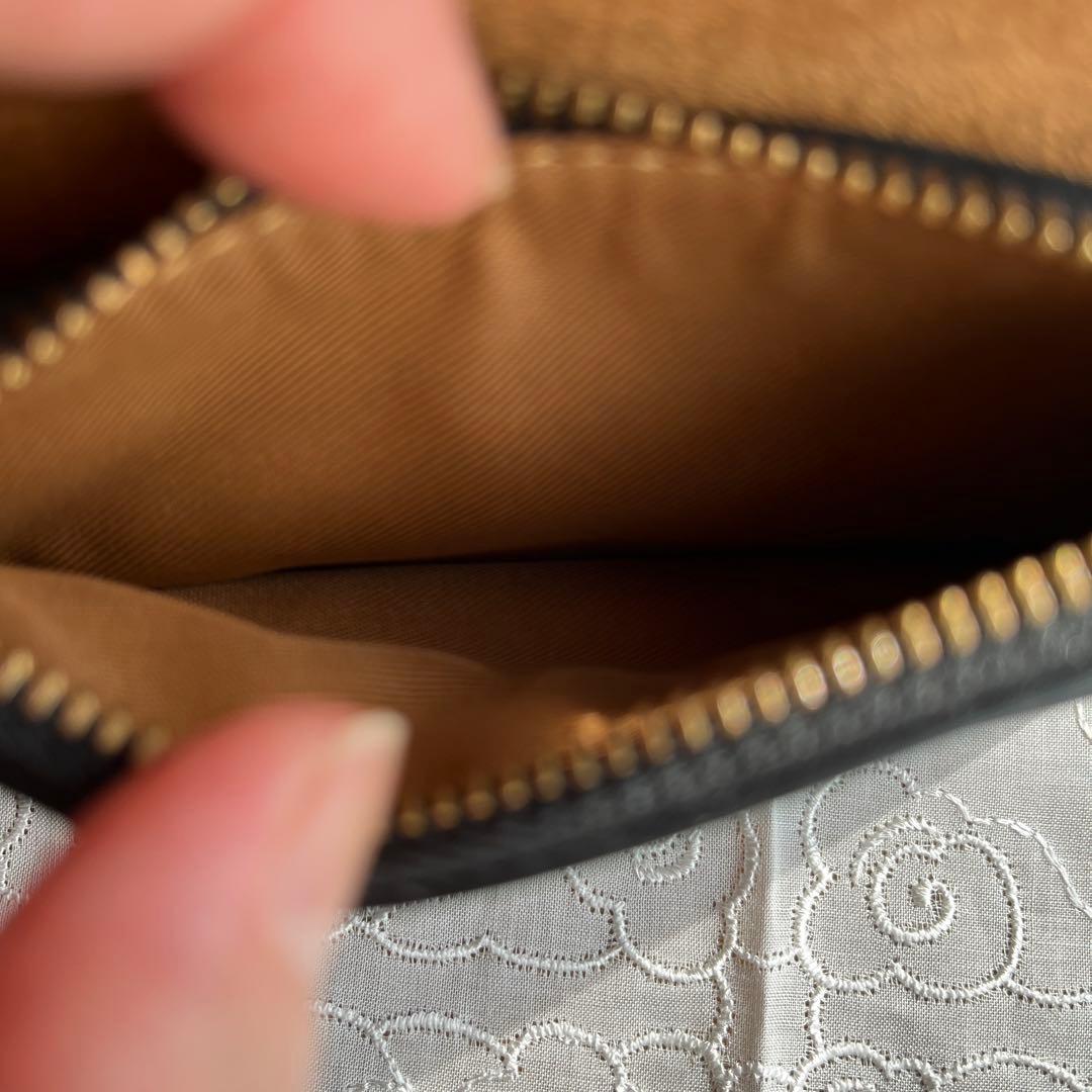 COACH 二つ折りミニ財布