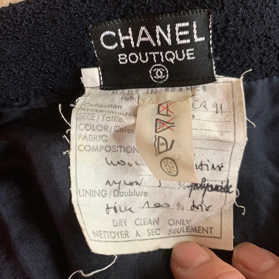 CHANEL シャネル　スカート　ツイード　ブラック CHANELのボタン付き