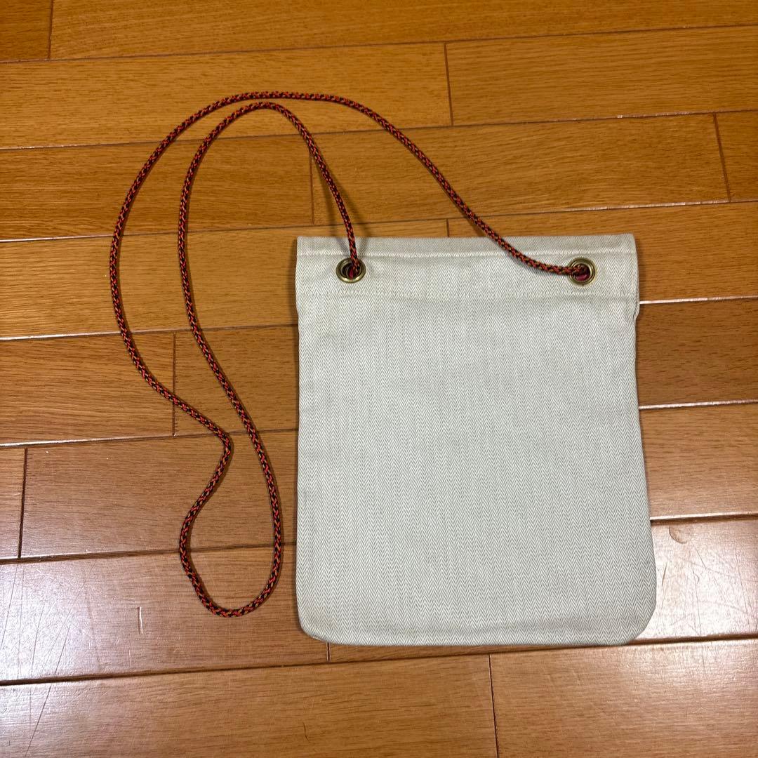 HERMÈS エルメス 巾着ポーチ ロゴ入り 紐付き ベージュ系