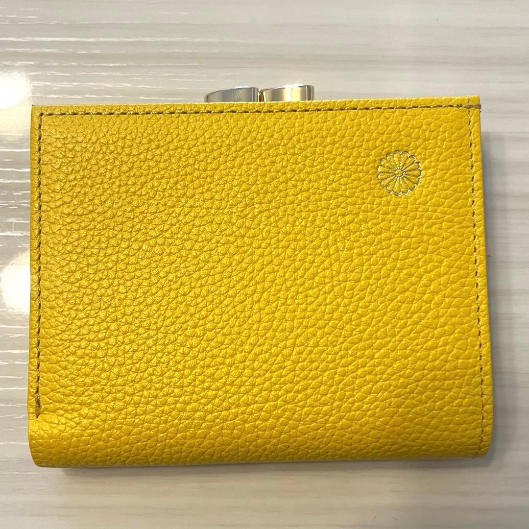 新品・未使用】皇居 二つ折り財布 黄色 イエロー がま口 - メルカリ