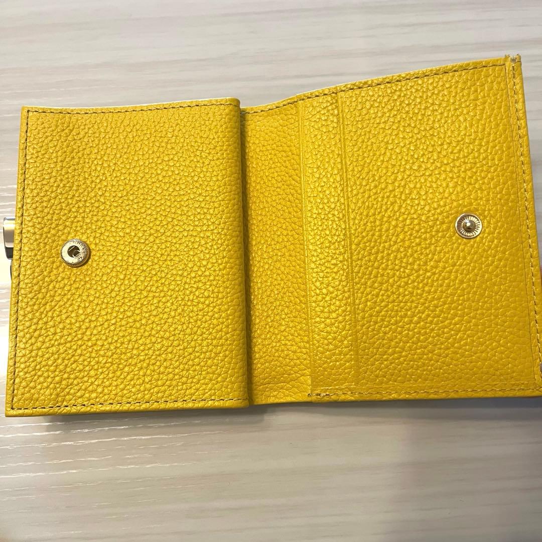 新品・未使用】皇居 二つ折り財布 黄色 イエロー がま口 - メルカリ