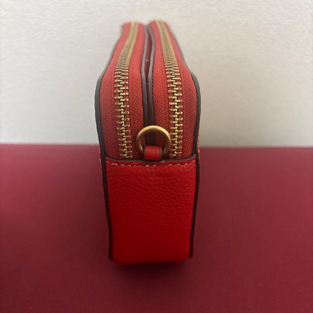 COACH レッド恐竜刺繍ポーチ