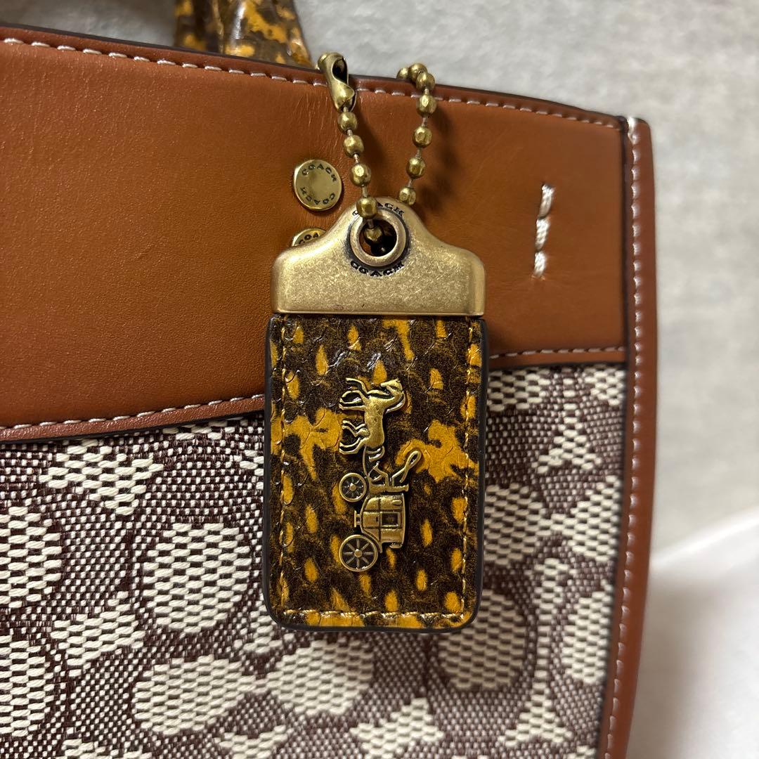 【お値下げ中】COACHローグ25 シグネチャーテキスタイル ハンドバッグ