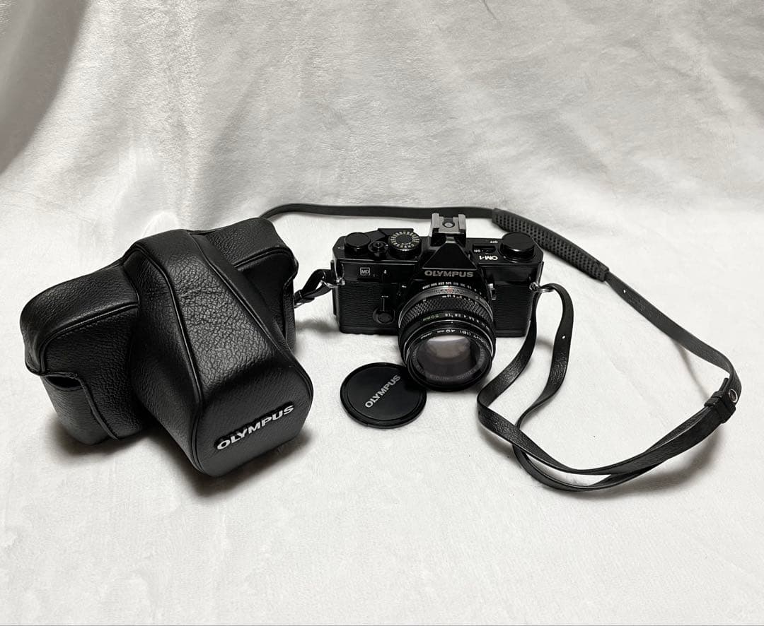 一眼レフカメラ オリンパスOM-INブラックカメラレンズ3本ストロボ等セット