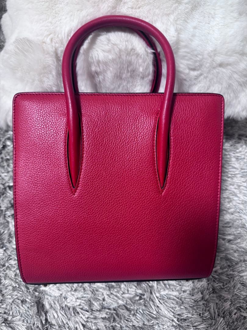 クリスチャンルブタン スタッズ付き赤レザーハンドバッグ