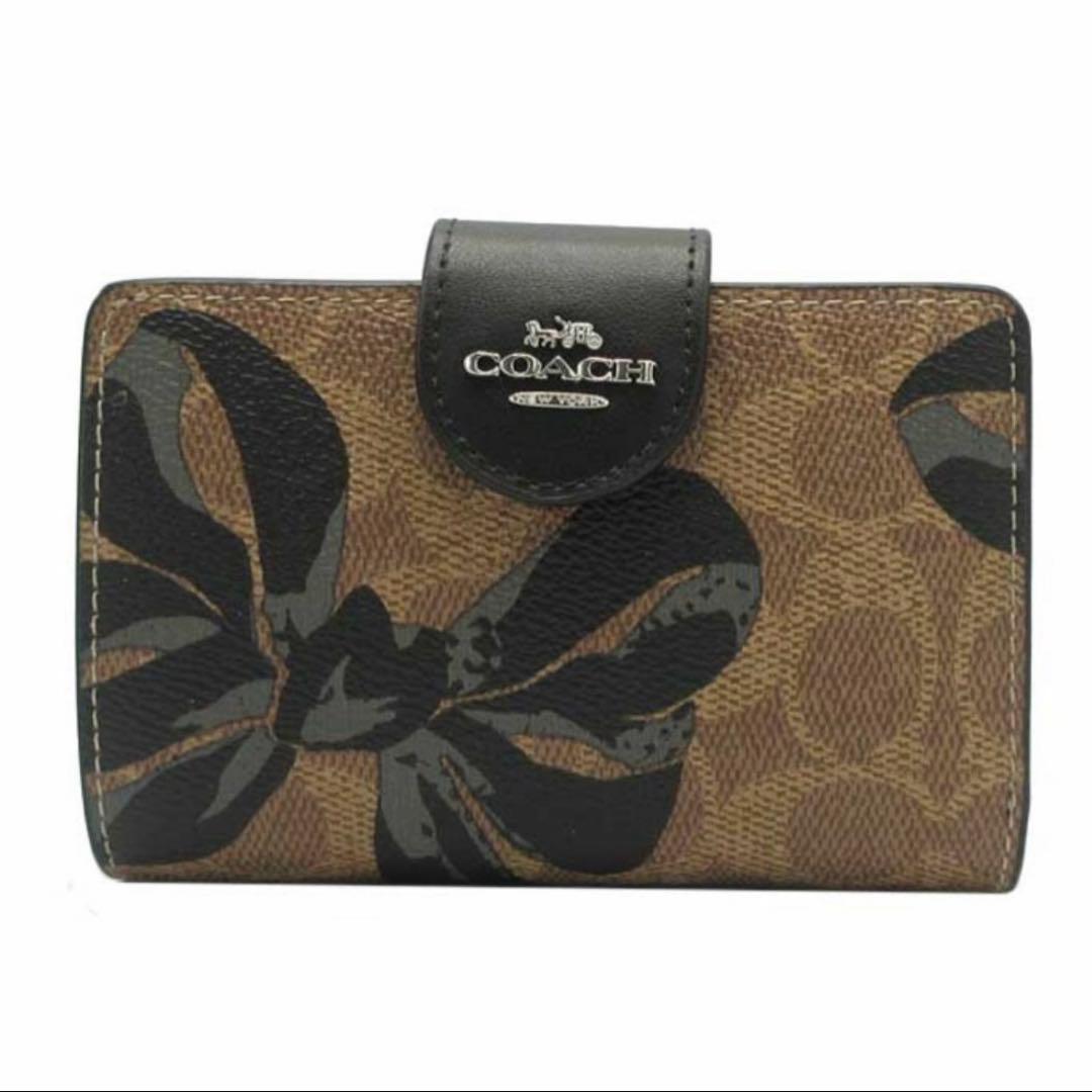 プレゼント 新品未使用 コーチ シグネチャー 二つ折り財布 リボン柄 大人可愛い