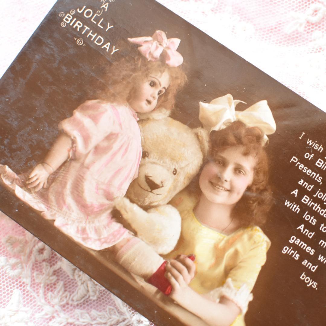 *アンティークポストカード　お人形とテディベアと仲良しな少女*