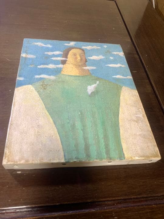 絵画　山のように大きな女性像です。