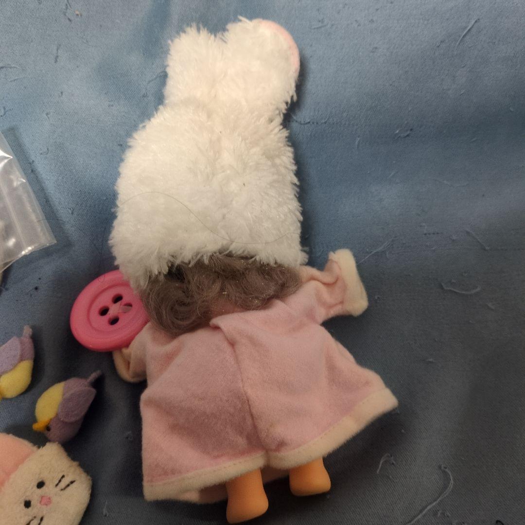 とんがり帽子のメモル 眠り顔のお人形 指しゃぶり人形
