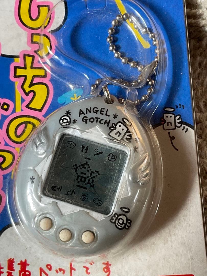 天使のたまごっち。バンダイ。新品未使用。シルバーピンク。【対象年齢12才以上】