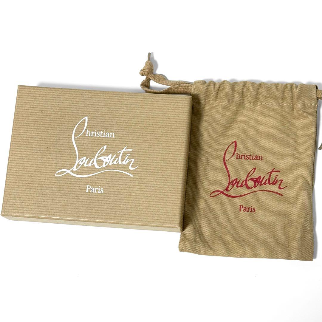 クリスチャンルブタン パネトーネ ケース デニム スタッズ ラウンドジップ