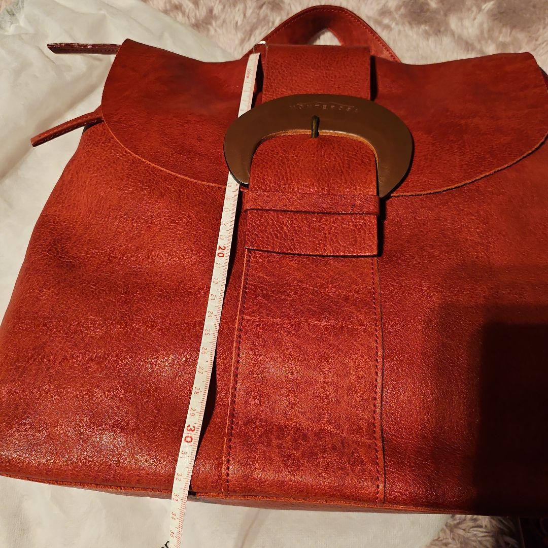 リュック muku オレンジレザーフラップバッグ